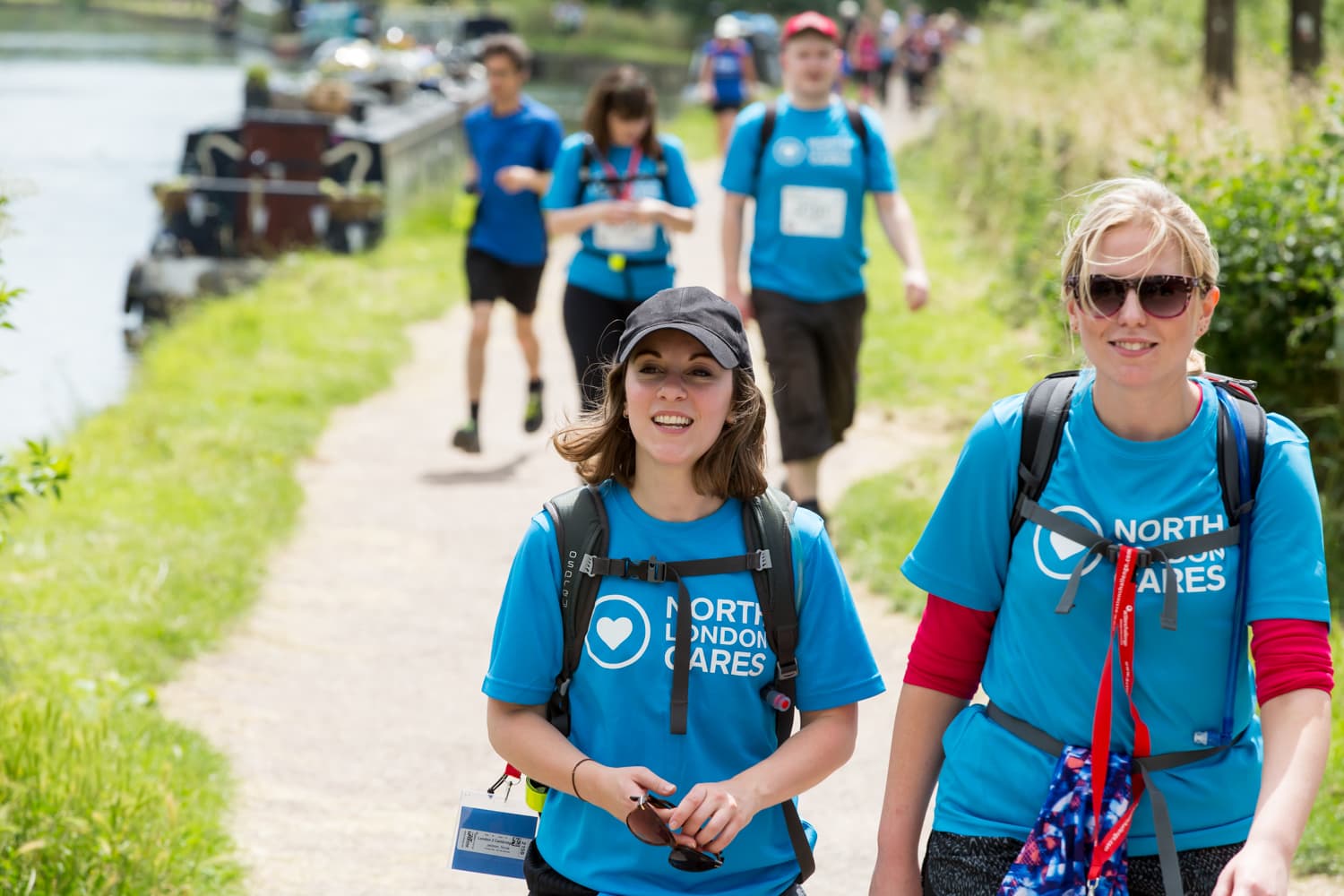 North London cares volunteers wearing bright blue shirts