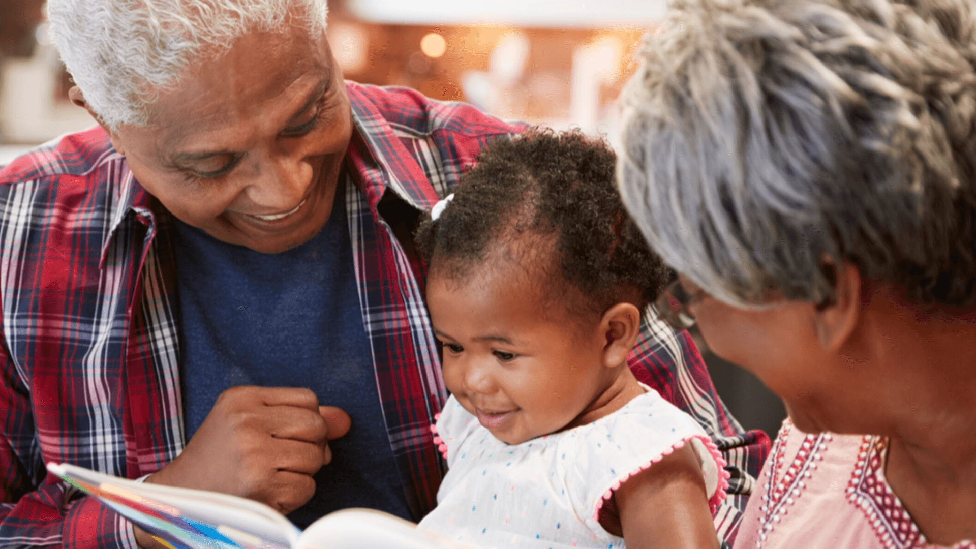 Older generation helping child read